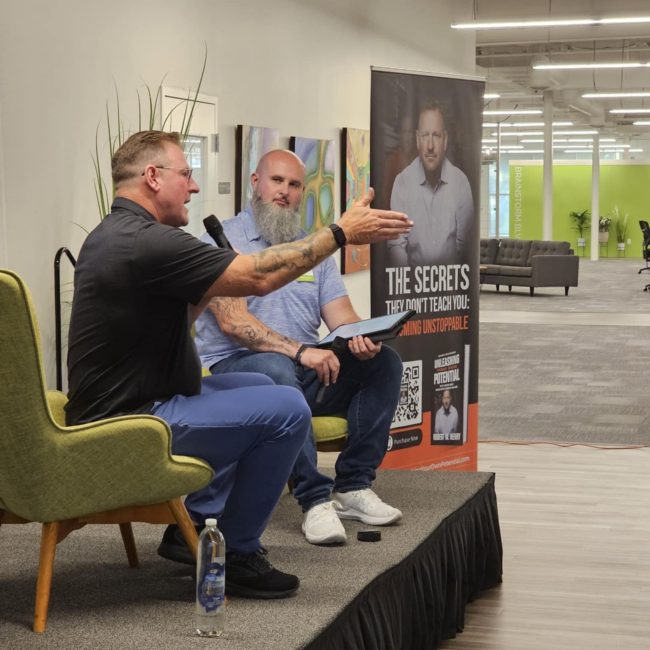 rob henry and shawn lloyd on stage