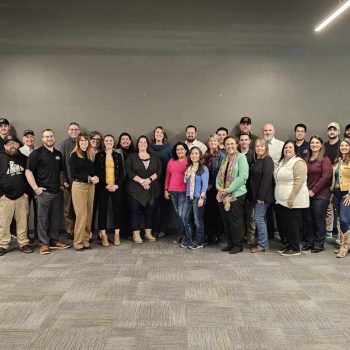 Wide shot of event members at mastermind connect event